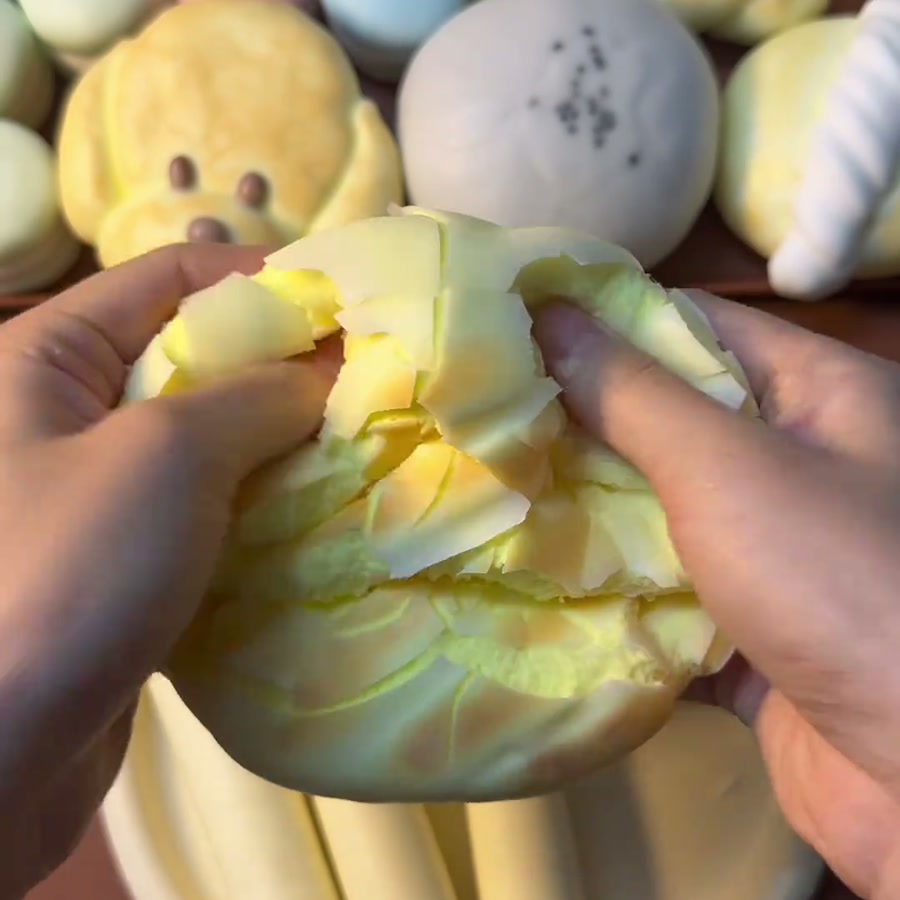 Striped Bun Squishy — close-up during pressing