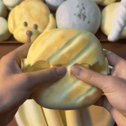Striped Bun Squishy — animated squeeze demonstration